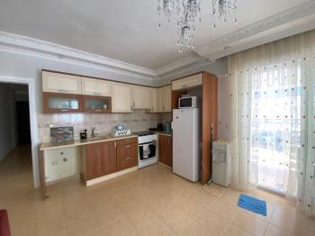 ALTINKUM MAHALLESİNDE DENİZE YÜRÜME MESAFESİNDE,SİTE İÇİNDE,HAVUZLU EŞYALI,,GENİŞ BALKONLU 2+1 SATILIK DAİRE