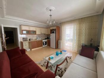 ALTINKUM MAHALLESİNDE DENİZE YÜRÜME MESAFESİNDE,SİTE İÇİNDE,HAVUZLU EŞYALI,,GENİŞ BALKONLU 2+1 SATILIK DAİRE