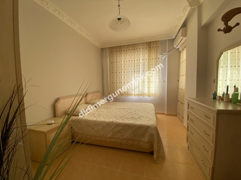 ALTINKUM MAHALLESİNDE DENİZE YÜRÜME MESAFESİNDE,SİTE İÇİNDE,HAVUZLU EŞYALI,,GENİŞ BALKONLU 2+1 SATILIK  DAİRE