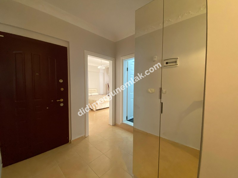 ALTINKUM MAHALLESİNDE DENİZE YÜRÜME MESAFESİNDE,SİTE İÇİNDE,HAVUZLU EŞYALI,,GENİŞ BALKONLU 2+1 SATILIK  DAİRE