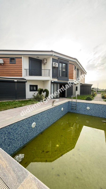  DİDİM HİSAR MAHALLESİNDE EŞYALI  HAVUZLU SİTE İÇİNDE  3+1  LÜKS  SATILIK VİLLA