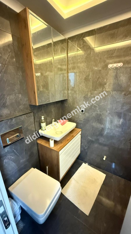  DİDİM HİSAR MAHALLESİNDE EŞYALI  HAVUZLU SİTE İÇİNDE  3+1  LÜKS  SATILIK VİLLA