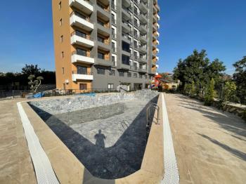 ALYANS'TAN ERDEMLİ'DE YATIRIM DEĞERİ YÜKSEK OTURUMA HAZIR 1+1