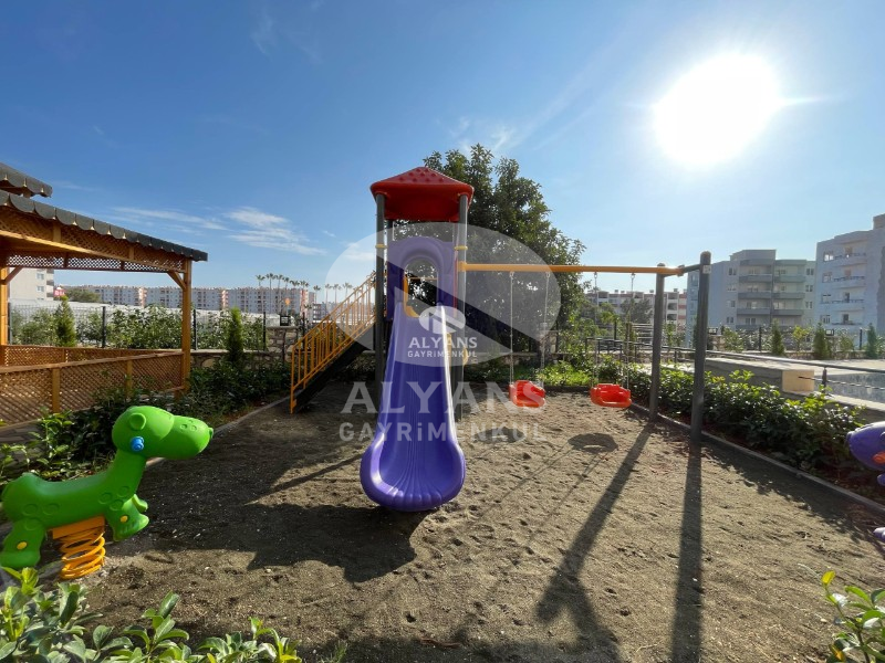 ALYANS'TAN ERDEMLİ'DE YATIRIM DEĞERİ YÜKSEK OTURUMA HAZIR 1+1