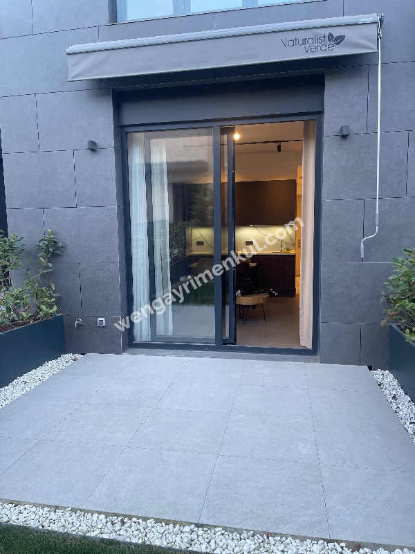 Wen Gayrimenkul den Naturalist Verde Kemerburgaz Projesinde Mobilyalı Kiralık 1+1 Bahçe Katı Daire