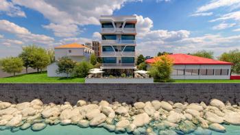 KKTC Lefke Gemikonağı'ndan Denize Sıfır Muhteşem Manzaralı Satılık Ultra Lüks Eşyalı 1+1 Daireler