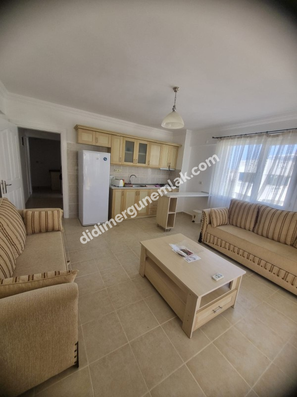  DİDİM ÇAMLIK MAHALLESİNDE EŞYALI SİTE İÇİNDE HAVUZ CEPHELİ FIRSAT 1+1 DAİRE