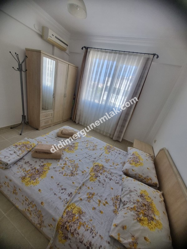  DİDİM ÇAMLIK MAHALLESİNDE EŞYALI SİTE İÇİNDE HAVUZ CEPHELİ FIRSAT 1+1 DAİRE