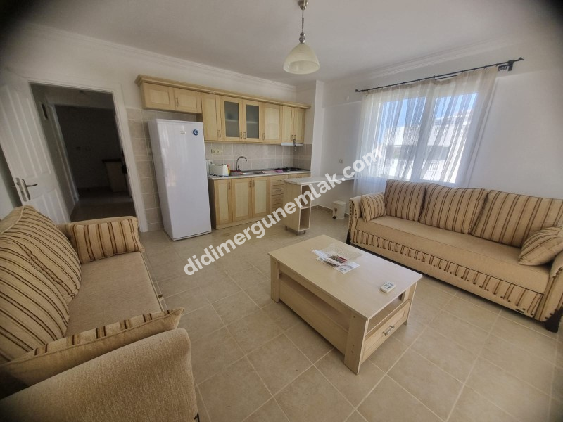  DİDİM ÇAMLIK MAHALLESİNDE EŞYALI SİTE İÇİNDE HAVUZ CEPHELİ FIRSAT 1+1 DAİRE