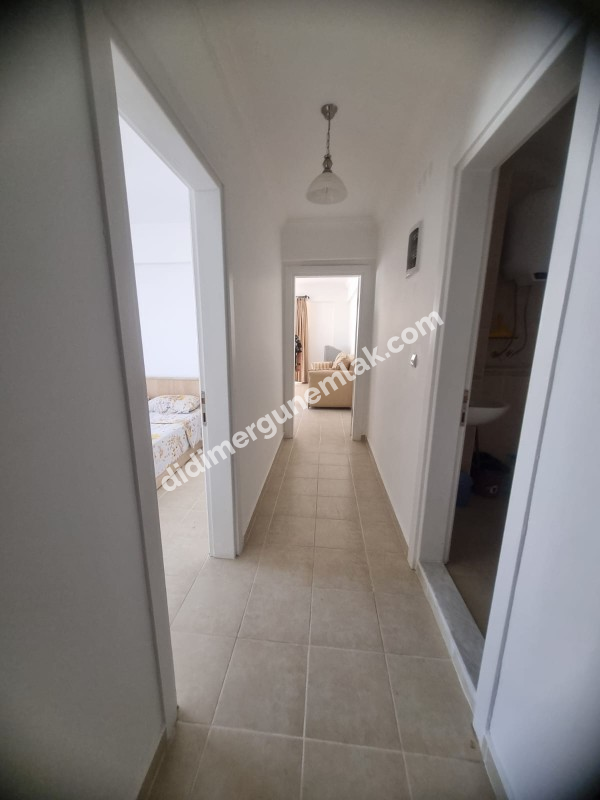  DİDİM ÇAMLIK MAHALLESİNDE EŞYALI SİTE İÇİNDE HAVUZ CEPHELİ FIRSAT 1+1 DAİRE