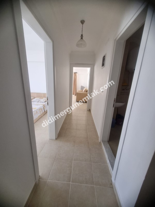  DİDİM ÇAMLIK MAHALLESİNDE EŞYALI SİTE İÇİNDE HAVUZ CEPHELİ FIRSAT 1+1 DAİRE