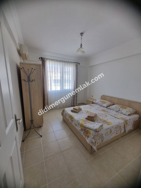  DİDİM ÇAMLIK MAHALLESİNDE EŞYALI SİTE İÇİNDE HAVUZ CEPHELİ FIRSAT 1+1 DAİRE