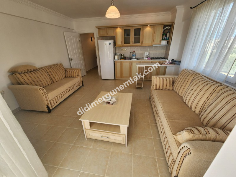  DİDİM ÇAMLIK MAHALLESİNDE EŞYALI SİTE İÇİNDE HAVUZ CEPHELİ FIRSAT 1+1 DAİRE