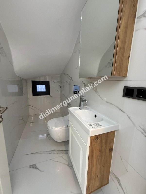  DİDİM CUMHURİYET MAHALLESİNDE  KÖŞEBAŞI KONUMDA ULTRA LÜKS 5+1 MÜSTAKİL HAVUZLU OTOPARKLI VİLLA