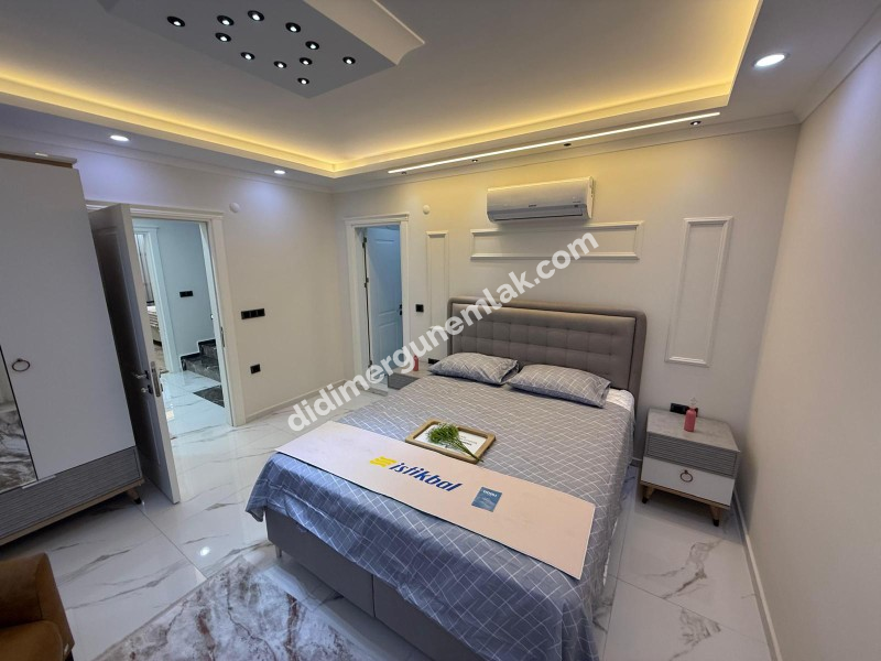  DİDİM CUMHURİYET MAHALLESİNDE  KÖŞEBAŞI KONUMDA ULTRA LÜKS 5+1 MÜSTAKİL HAVUZLU OTOPARKLI VİLLA