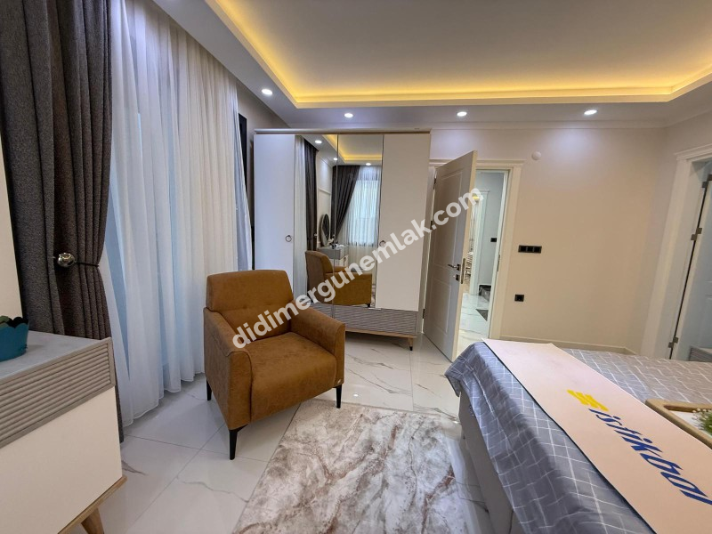  DİDİM CUMHURİYET MAHALLESİNDE  KÖŞEBAŞI KONUMDA ULTRA LÜKS 5+1 MÜSTAKİL HAVUZLU OTOPARKLI VİLLA