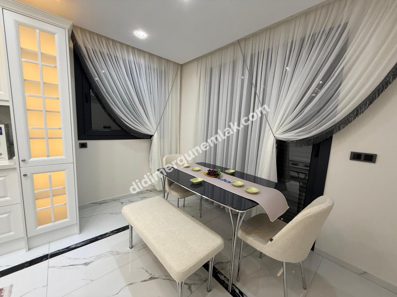  DİDİM CUMHURİYET MAHALLESİNDE  KÖŞEBAŞI KONUMDA ULTRA LÜKS 5+1 MÜSTAKİL HAVUZLU OTOPARKLI VİLLA