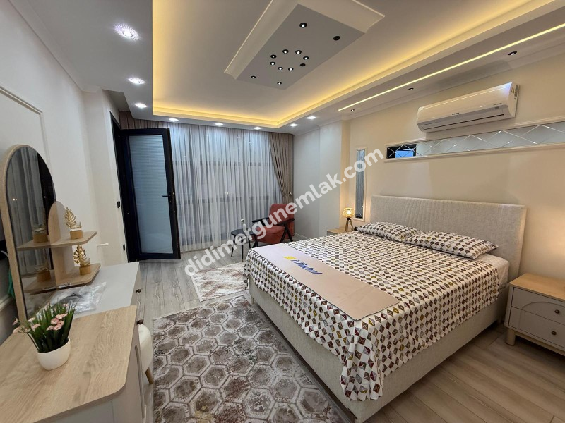  DİDİM CUMHURİYET MAHALLESİNDE  KÖŞEBAŞI KONUMDA ULTRA LÜKS 5+1 MÜSTAKİL HAVUZLU OTOPARKLI VİLLA