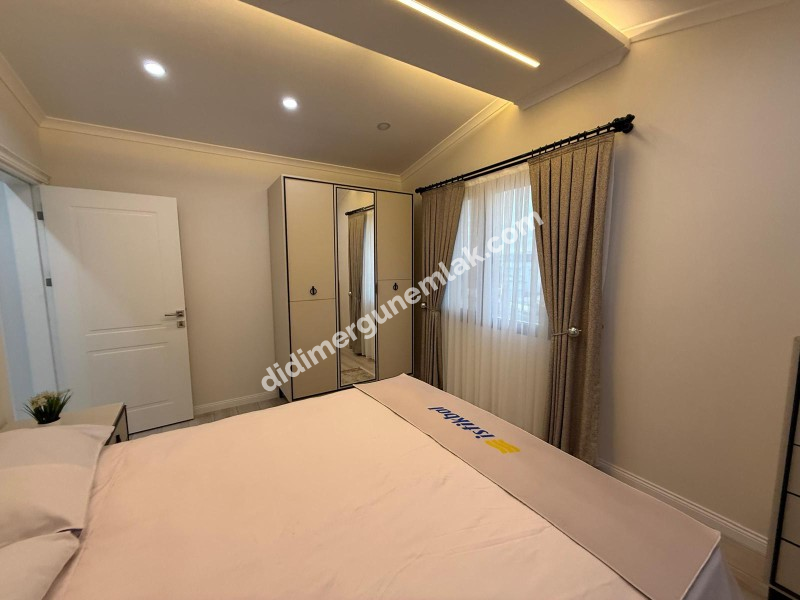  DİDİM CUMHURİYET MAHALLESİNDE  KÖŞEBAŞI KONUMDA ULTRA LÜKS 5+1 MÜSTAKİL HAVUZLU OTOPARKLI VİLLA