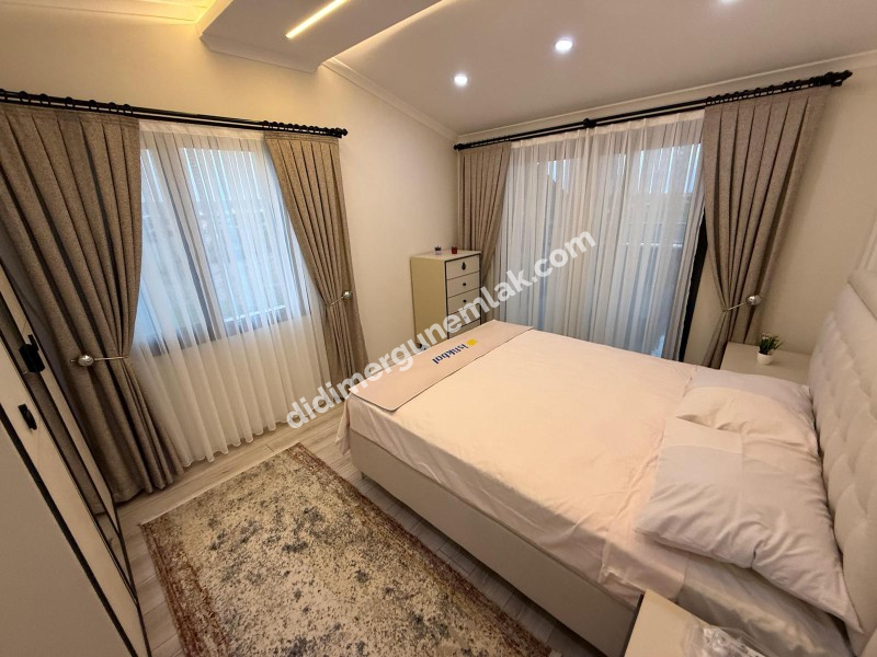  DİDİM CUMHURİYET MAHALLESİNDE  KÖŞEBAŞI KONUMDA ULTRA LÜKS 5+1 MÜSTAKİL HAVUZLU OTOPARKLI VİLLA