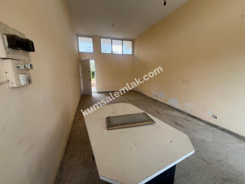 Alayköy'de zeminkat satılık dükkan