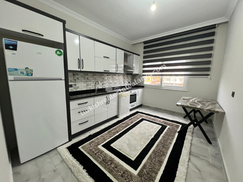 Alanya Demirtaš – na prodaju 2+1 stan sa odvojenom kuhinjom, 200 metara do mora, pogled na more