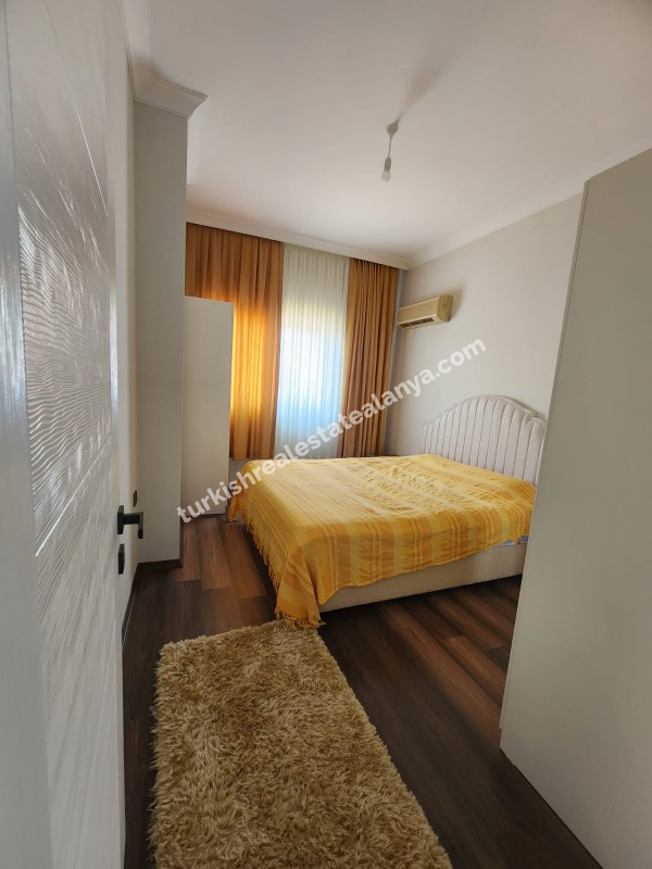 Alanya Demirtaš – na prodaju 2+1 stan sa odvojenom kuhinjom, 200 metara do mora, pogled na more