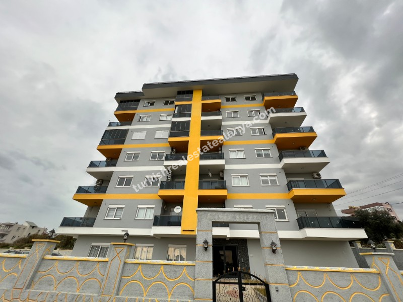 Alanya Demirtaš – na prodaju 2+1 stan sa odvojenom kuhinjom, 200 metara do mora, pogled na more