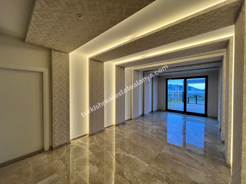 Alanya Demirtaš – na prodaju 2+1 stan sa odvojenom kuhinjom, 200 metara do mora, pogled na more