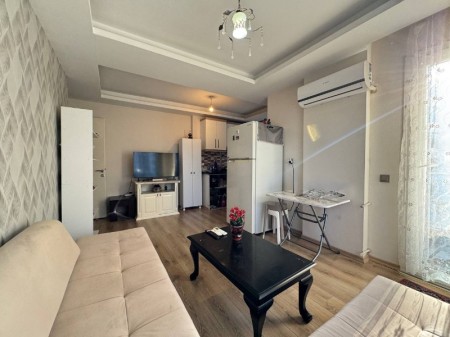 ALYANS'TAN MERKEZİ KONUMDA KORİDORLU BALKONLU GENİŞ 1+1