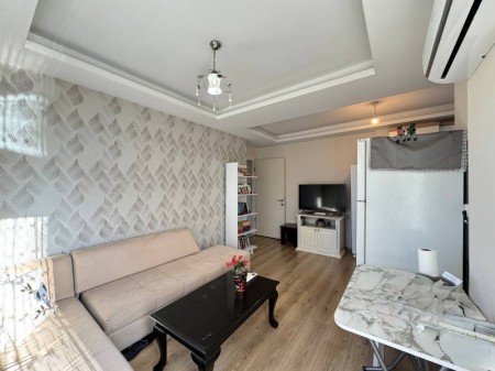 ALYANS'TAN MERKEZİ KONUMDA KORİDORLU BALKONLU GENİŞ 1+1