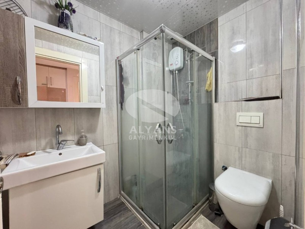 ALYANS'TAN MERKEZİ KONUMDA KORİDORLU BALKONLU GENİŞ 1+1