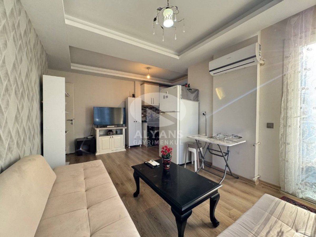 ALYANS'TAN MERKEZİ KONUMDA KORİDORLU BALKONLU GENİŞ 1+1