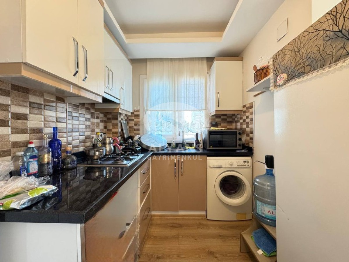 ALYANS'TAN MERKEZİ KONUMDA KORİDORLU BALKONLU GENİŞ 1+1