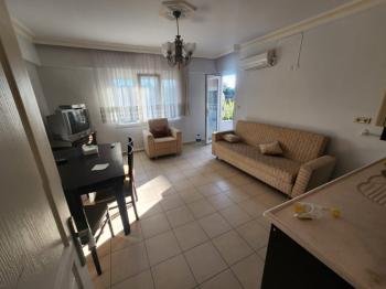 ALTINKUM MAH.DENİZE YAKIN BULVARA YÜRÜME MESAFESİNDE SATILIK KISMI EŞYALI 2+1 DAİRE 