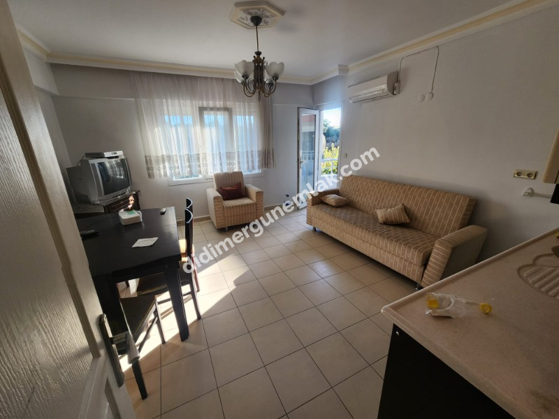 ALTINKUM MAH.DENİZE YAKIN BULVARA YÜRÜME MESAFESİNDE SATILIK KISMI EŞYALI 2+1 DAİRE 