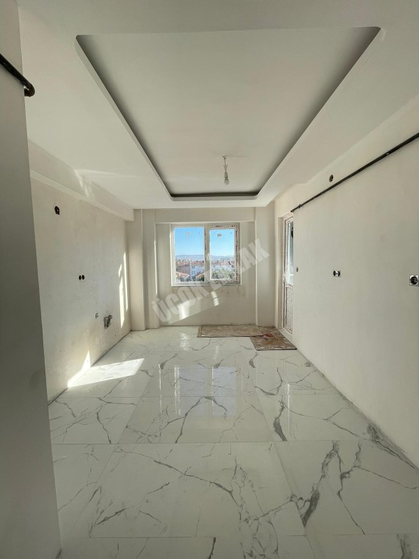 AFYON ÜÇOK EMLAKTAN HARBİŞ GAZİ MAH SATILIK SIFIR 3+1-- 2+1 DAİRELER