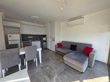 KKTC Girne Merkezde Çarşıya Yürüyüş Mesafesinde Deniz Manzaralı Satılık 1+1 Eşyalı Daire