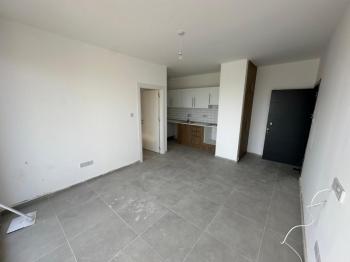 KÜÇÜK KAYMAKLI'DA ŞİRKETE  TAKSİTLİ SATILIK DAİRELER