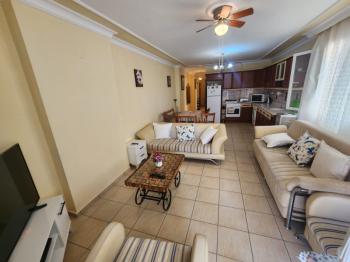 DİDİM ALTINKUM MAHALLESİNDE DENİZE 100 METRE AÇIK MUTFAKLI 2+1 SATILIK DAİRE