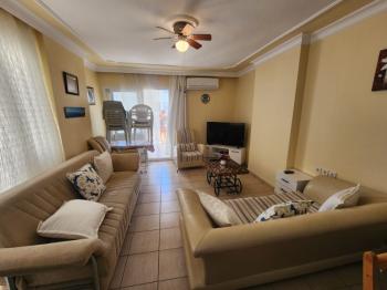 DİDİM ALTINKUM MAHALLESİNDE DENİZE 100 METRE AÇIK MUTFAKLI 2+1 SATILIK DAİRE