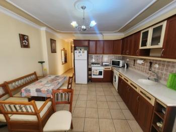 DİDİM ALTINKUM MAHALLESİNDE DENİZE 100 METRE AÇIK MUTFAKLI 2+1 SATILIK DAİRE