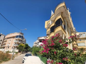 DİDİM ALTINKUM MAHALLESİNDE DENİZE 100 METRE AÇIK MUTFAKLI 2+1 SATILIK DAİRE