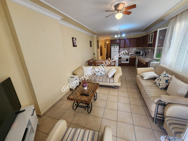 DİDİM ALTINKUM MAHALLESİNDE DENİZE 100 METRE AÇIK MUTFAKLI 2+1 SATILIK DAİRE