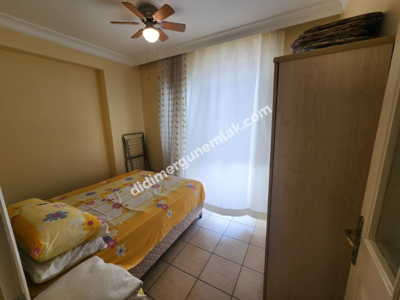 DİDİM ALTINKUM MAHALLESİNDE DENİZE 100 METRE AÇIK MUTFAKLI 2+1 SATILIK DAİRE