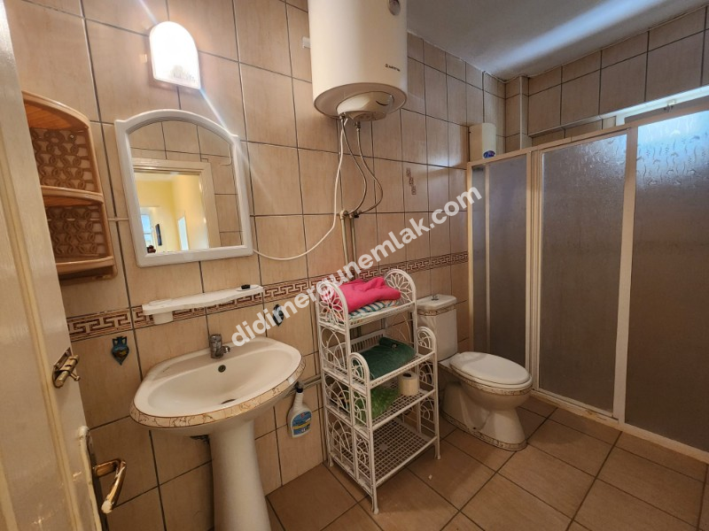 DİDİM ALTINKUM MAHALLESİNDE DENİZE 100 METRE AÇIK MUTFAKLI 2+1 SATILIK DAİRE