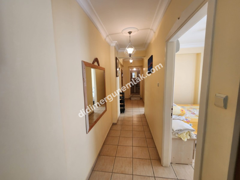 DİDİM ALTINKUM MAHALLESİNDE DENİZE 100 METRE AÇIK MUTFAKLI 2+1 SATILIK DAİRE