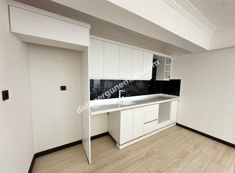 DİDİM ÇAMLIK MAHALLESİNDE DENİZE YÜRÜYÜŞ MESAFESİNDE,TAMAMEN YENİLENMİŞ EFSANE FİYATLI MASRAFSIZ VE ŞIK 2+1 SATILIK DAİRE!