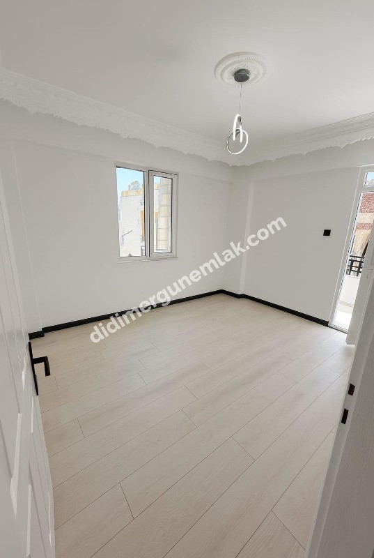 DİDİM ÇAMLIK MAHALLESİNDE DENİZE YÜRÜYÜŞ MESAFESİNDE,TAMAMEN YENİLENMİŞ EFSANE FİYATLI MASRAFSIZ VE ŞIK 2+1 SATILIK DAİRE!