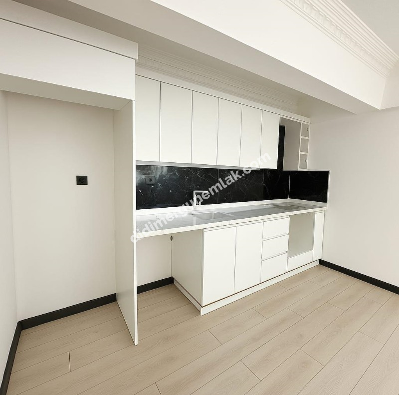 DİDİM ÇAMLIK MAHALLESİNDE DENİZE YÜRÜYÜŞ MESAFESİNDE,TAMAMEN YENİLENMİŞ EFSANE FİYATLI MASRAFSIZ VE ŞIK 2+1 SATILIK DAİRE!